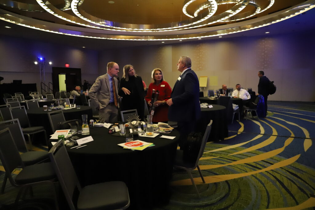 NASID members working together in small groups at the NASID conference.